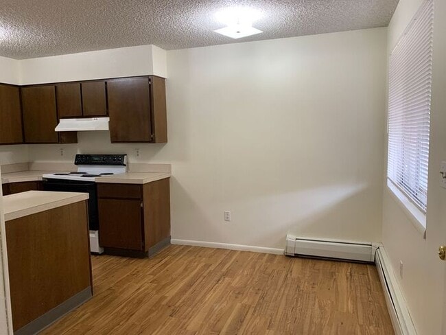 Photo - 5 Month lease special, $100/mo off! Priced at $1348 after discount. 2 Bed, 1 Bath Apartment. RENT...