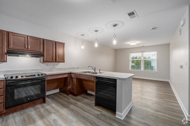 2BR, 1BA - 872SF - Kitchen - Bee Creek Crossing (Senior Apartments 55+)