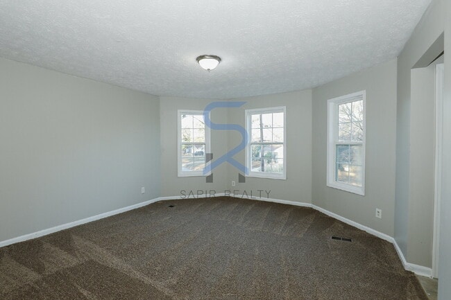 Photo - Move in before December 31st and choose your reward: a $250 Amazon Gift Card or a 55 Smart TV! Apartment