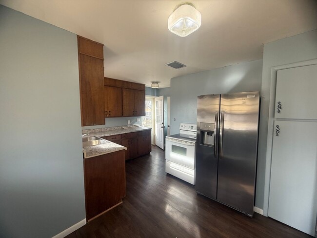 Building Photo - Two bedrooms, one and half bathroom, pet friendly, home, with a one car, detached garage!