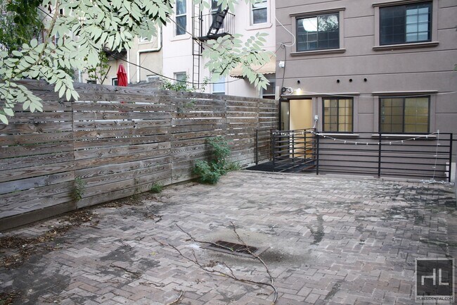 Building Photo - Duplex w/ two private outdoor spaces, and ...