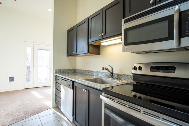 Photo - Corner 2 Bedroom with DW, W/D, Fireplace + Juliette Balcony! Apartment