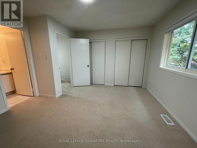 Building Photo - 703 Four Winds Way