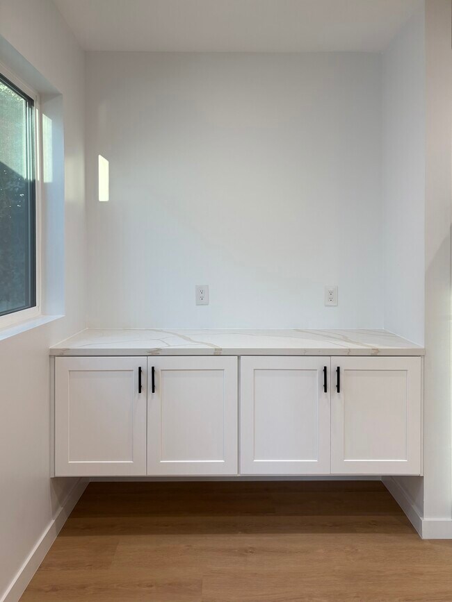 Built in TV cabinet for extra storage. - 7834 S Harvard Blvd