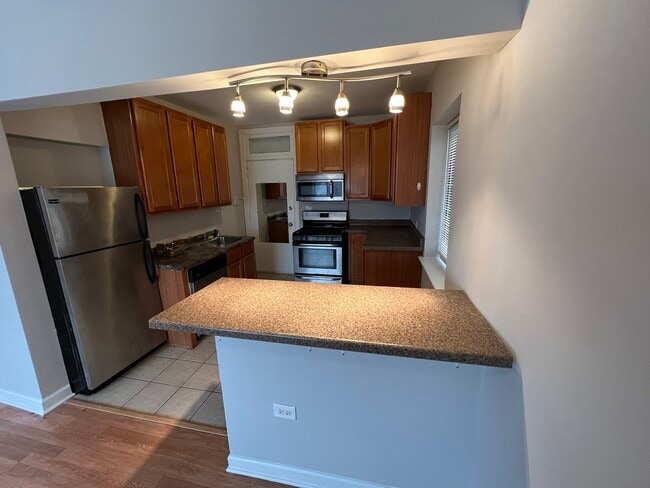 Foto del edificio - 4946 N Harding Ave