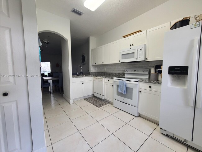 Building Photo - 5670 NW 116th Ave