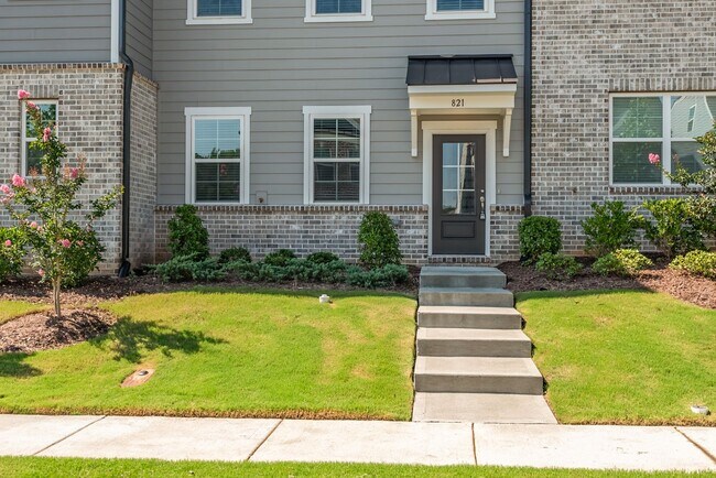 Building Photo - 4 Bedroom Townhome in Ashton Woods Community