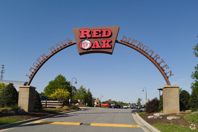 A stunning sign welcomes Whitsett guests to Red Oak Lager Haus & Biergarten.