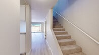 Located at 1450 Creekside Dr in Walnut Creek, CA, this two-story, 2-bedroom, 2-bathroom home offers a well-organized layout spread across two floors. The main level features light wood laminate flooring throughout, a bright and open living room equipped with a ceiling fan and a sliding glass door that opens to a private outdoor area, allowing natural light to fill the space. The kitchen is efficiently designed with white cabinetry, granite-style countertops, a stainless steel sink, and white appliances, complemented by a louvered window that brings in additional natural light. A convenient pass-through connects the kitchen to the living area. Carpeted stairs lead to the upper level, where both bedrooms are situated. The primary bedroom is generously sized, featuring plush carpeting, a sliding glass door opening to a private balcony, and a spacious closet with built-in shelving. The second bedroom also offers comfortable carpeting and ample closet space. Both bathrooms are finished with granite-topped vanities and wood-style flooring. Each floor is thoughtfully proportioned, with the two levels offering a balanced and functional use of space throughout the home.