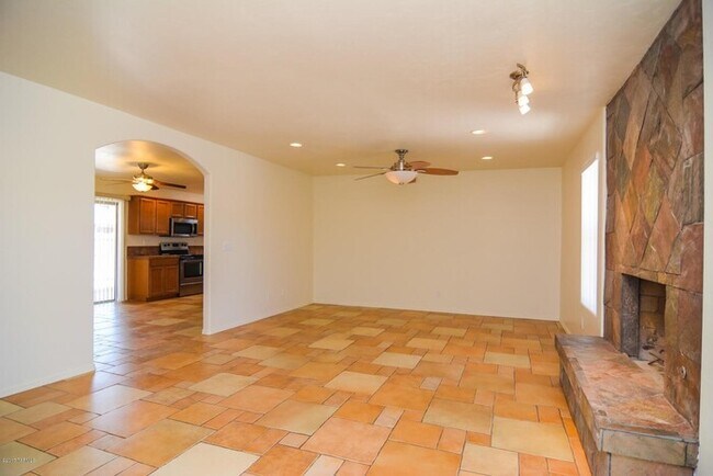 Building Photo - Spacious 4BR/2BA Tucson Home | Modern Tile Floors & Private Fenced Yard