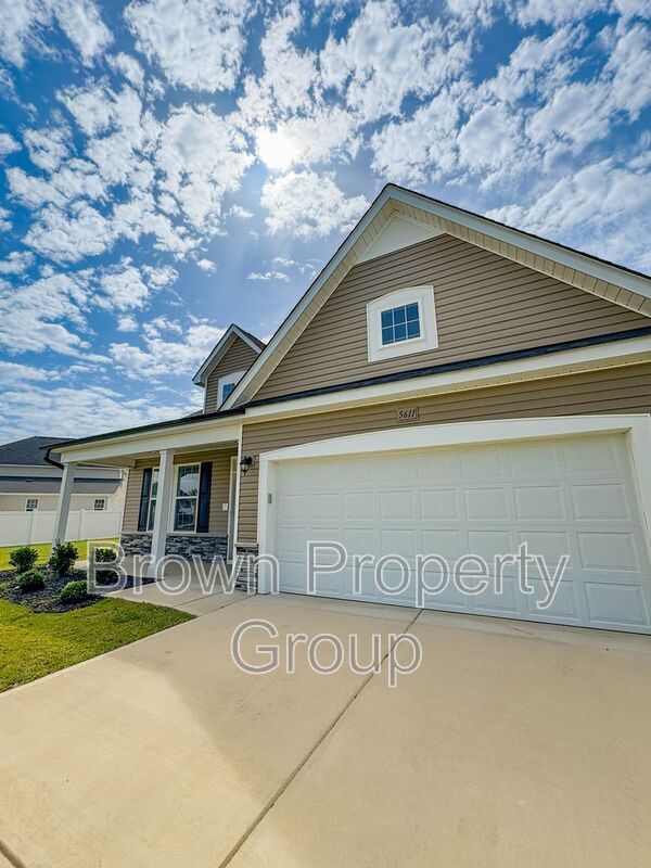 Foto del edificio - 5611 Pondhaven Dr
