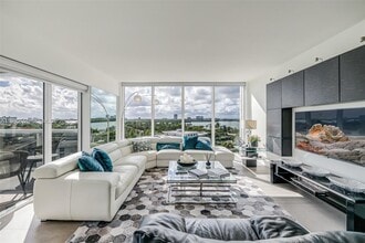 Building Photo - 10275 Collins Ave
