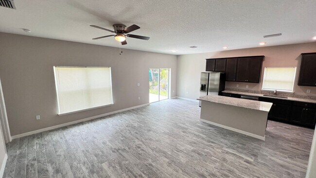 Building Photo - Spacious 3-Bedroom Home with Garage & Pati...