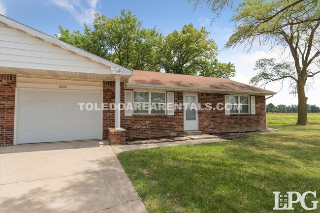 Building Photo - 6820 Wagoner Dr