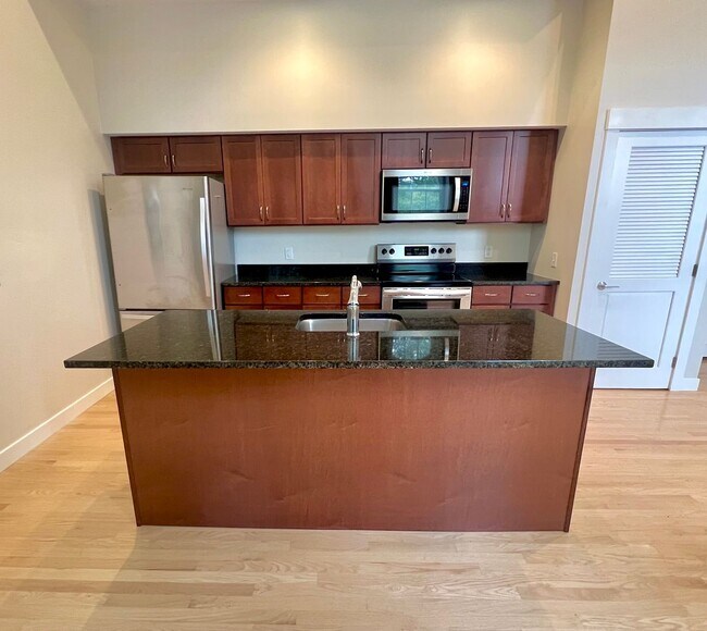 Building Photo - Putnam Block Hotel - One Bedroom Apartment...