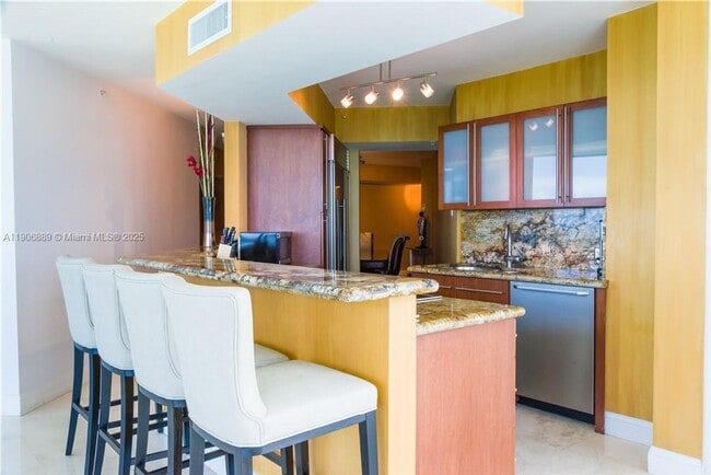 Building Photo - 6301 Collins Ave