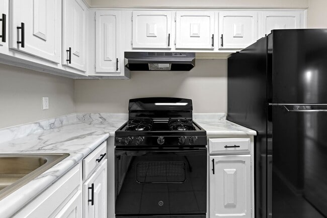 Building Photo - The Cedars Apartment Homes