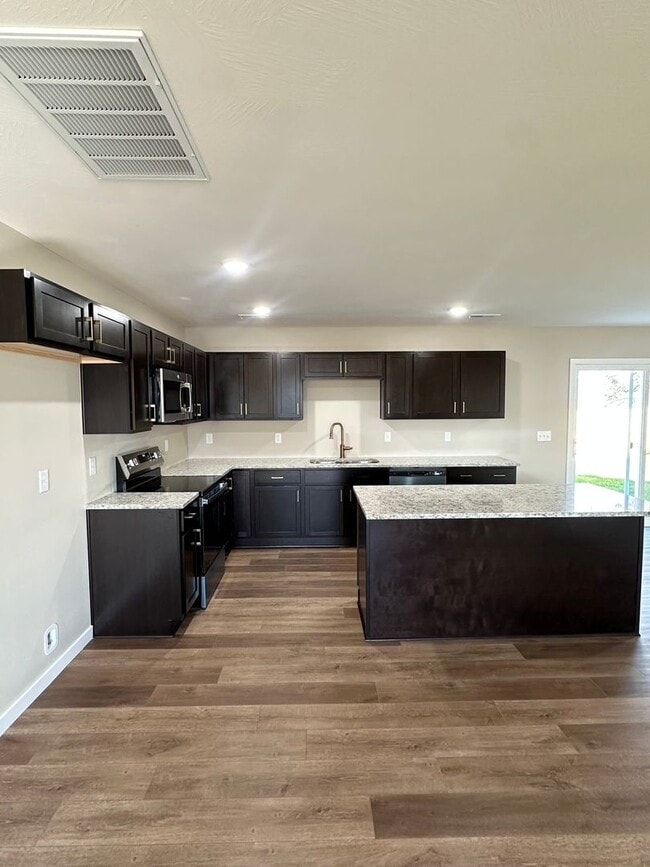 Building Photo - Brand-New 4 Bedroom Home with Modern Finishes & Private Backyard