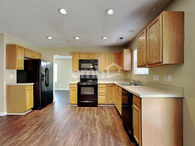 Foto del edificio - 5108 Weeping Cherry Dr