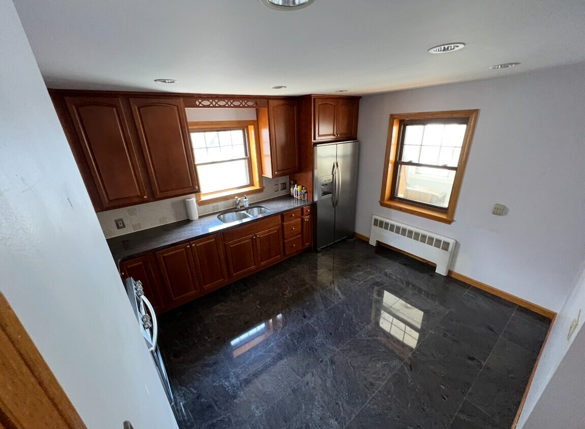 Eat In Kitchen with Modern Appliances and granite countertops. - 202 Orient Ave (Boston, MA)