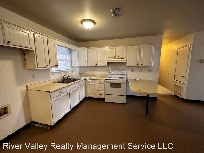 Foto del edificio - 3 br, 1.5 bath House - 1002 E 22nd St