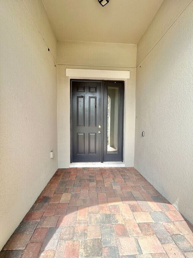 Foto del edificio - Stylish 4/3 Home with Covered Patio & Gara...