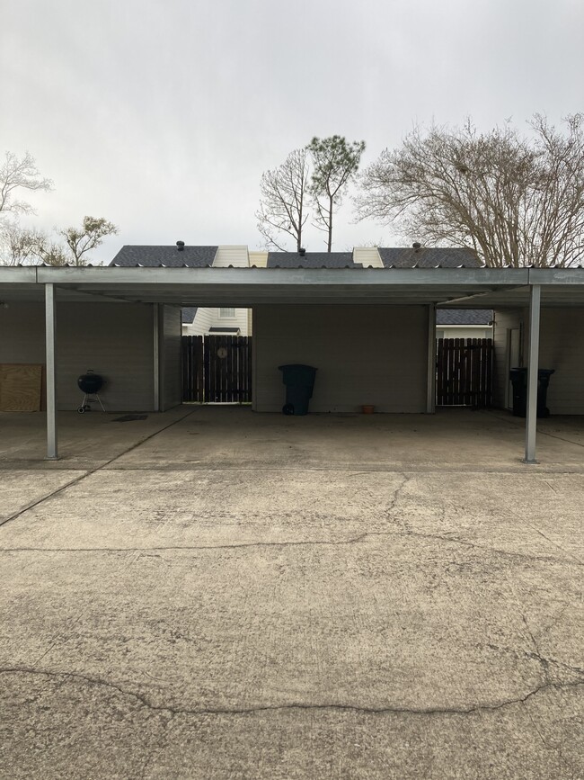 2 car covered carport with storage room - 1325 Moss St