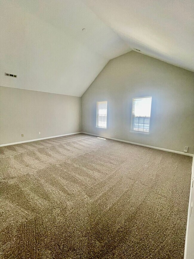 Building Photo - Come take a look at the gorgeous newly renovated 4 bedroom, 2.5 bath, 2 car garage home located i...