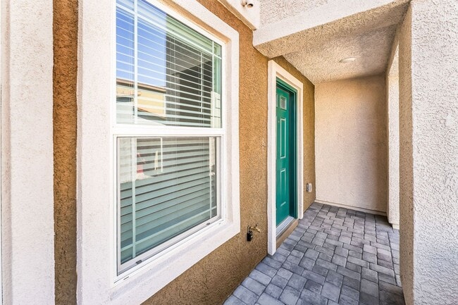 Building Photo - Modern West Henderson Townhome with Sleek Upgrades & Smart Home Features!