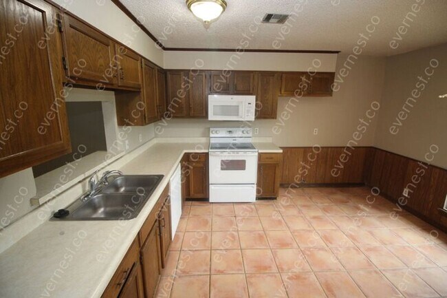 Foto del edificio - 8713 E 60th Pl