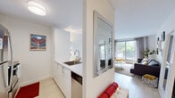 Located at 2470 Southvale Crescent in Ottawa, this efficiently designed one-bedroom, one-bathroom unit offers a well-organized layout across a single floor. Light hardwood-style flooring flows throughout, lending a clean, cohesive look to the space.

The living room serves as the heart of the unit, featuring a large window that frames outdoor greenery and fills the room with natural light. White walls and a neutral palette create an open, airy atmosphere. A large decorative mirror in the hallway enhances the sense of space upon entry.

The galley-style kitchen is thoughtfully arranged with white cabinetry, light countertops, stainless steel appliances including an electric range, microwave, and refrigerator, and a subway tile backsplash. It connects seamlessly to the main living area.

The bedroom is a comfortable, well-proportioned retreat featuring a window with soft drapery, built-in sliding panel closets, and light hardwood-style flooring. The room accommodates a full-sized bed with ease.

The bathroom includes a full bathtub with shower, toilet, and vanity, finished in clean white tones with neutral tile flooring. The overall design of this unit prioritizes functionality and a bright, modern aesthetic.
