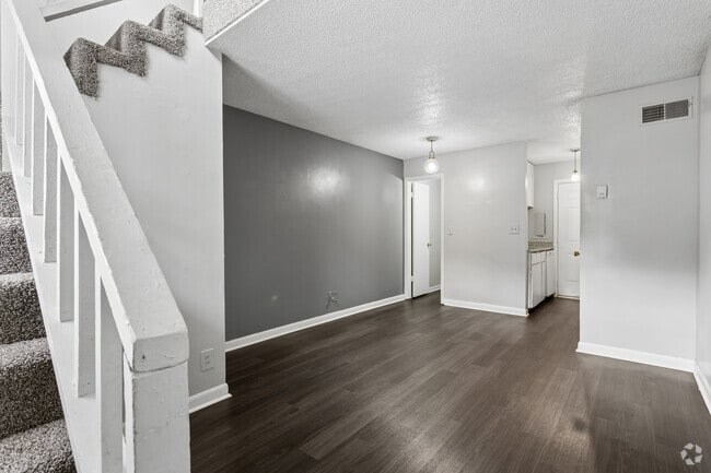 1BR, 1.5BA - 630SF - Living Room - Brookhaven Townhomes