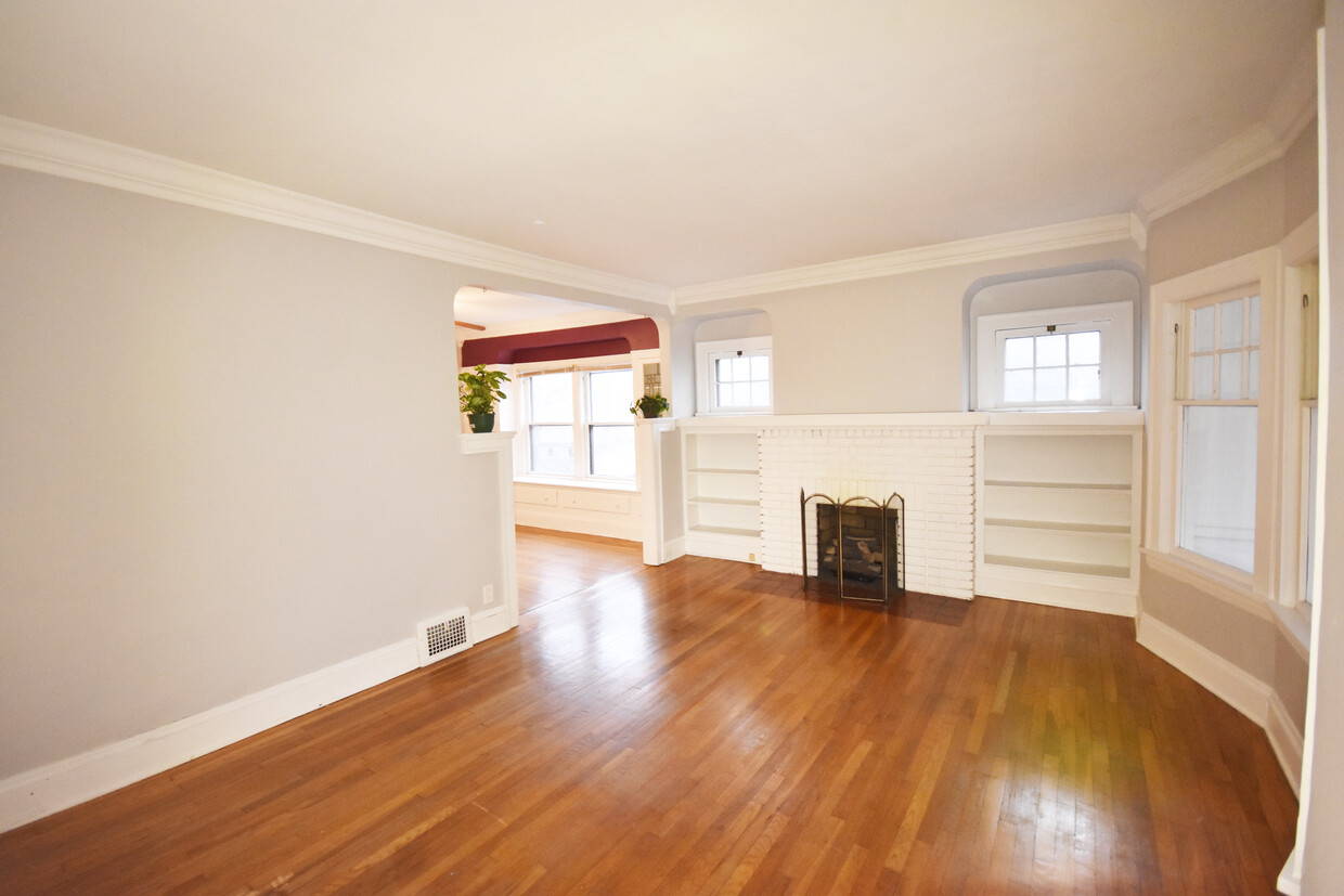 Large living room with built in bookshelves - 10105 Burton Ave