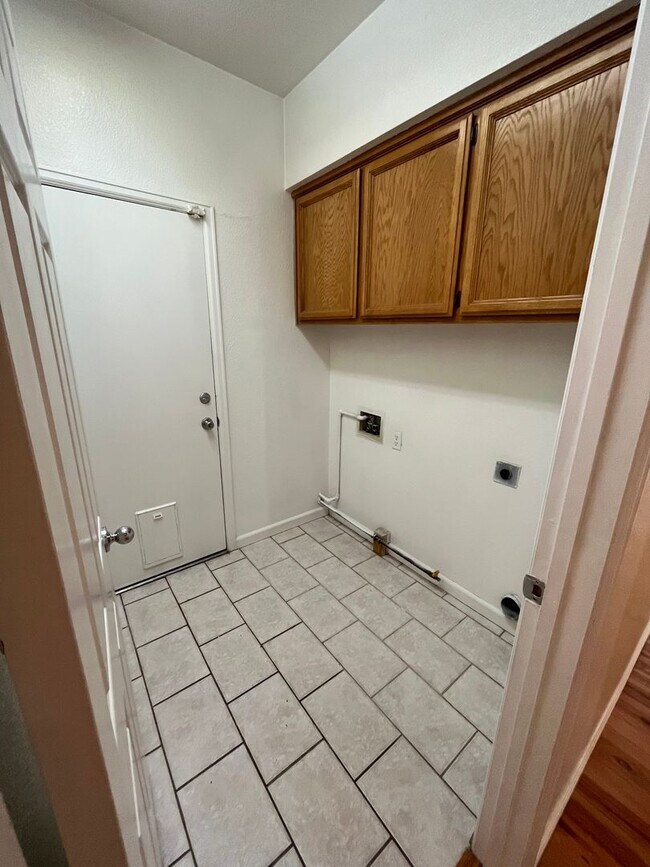 Building Photo - 3 Bed| 2 Bath | 1243 SF | 2 Car Garage | Single Story | Tenant pays $175 monthly for WS&G