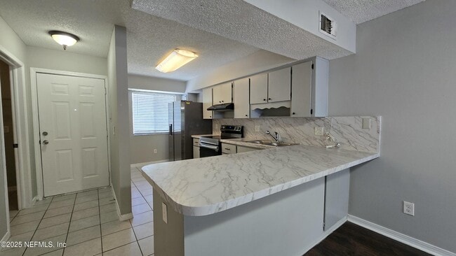 Building Photo - 2104 Dunes Way Dr W