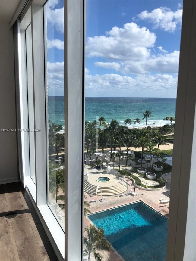 Building Photo - 10275 Collins Ave