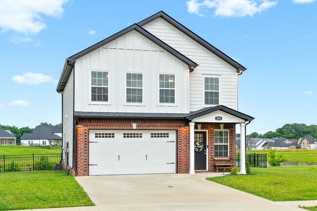 Building Photo - Stocked Pond, Walking Trails and More!!