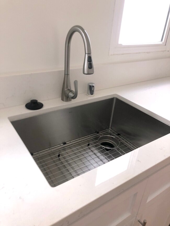 new sink, faucet and garbage disposal - 1476 S Sherbourne Dr