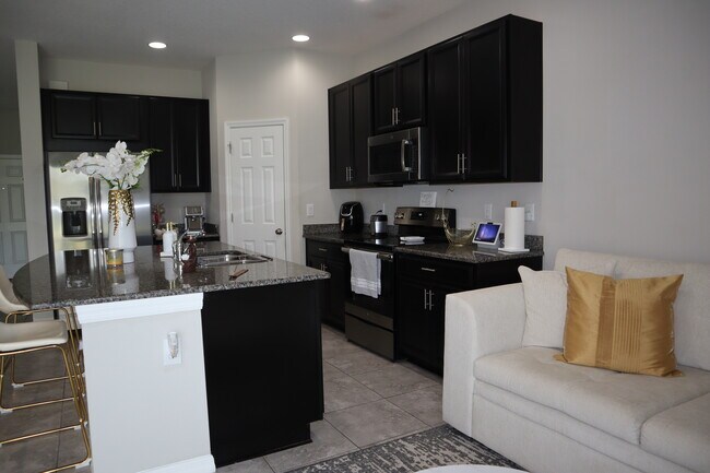 Foto del edificio - 7022 Grand Elm Dr