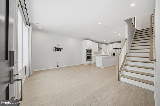 Photo - 7488 Backett Wood Ter Townhome