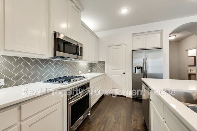 Foto del edificio - 7208 Huckleberry Dr