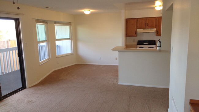 Dining area next to kitchen. New carpet throughout and new windows. - 2247 Split Rock Dr