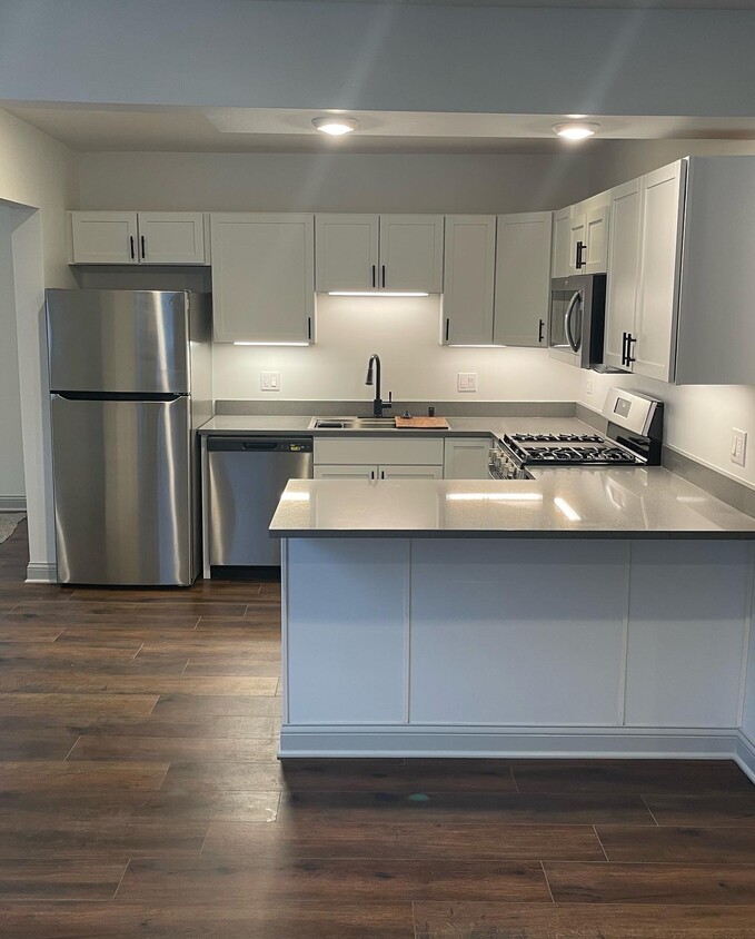 Kitchen with island - 710 N State St