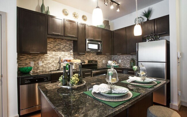 Building Photo - Boutique Living with Modern Comfort!