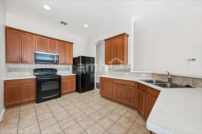 Building Photo - 14056 Wrangler Way