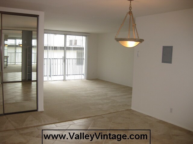 Living room toward balcony - 11687 Montana Ave