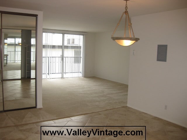 Living room toward balcony - 11687 Montana Ave