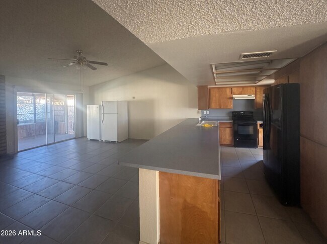 Building Photo - 6420 W College Dr