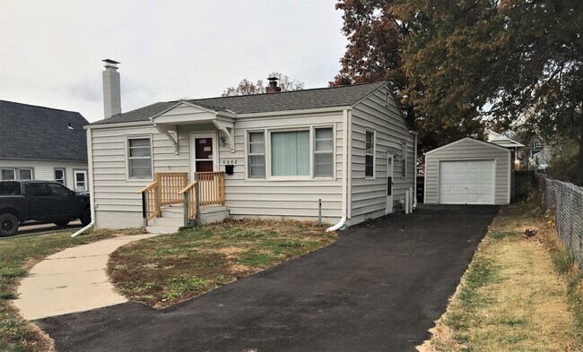 New asphalt drive with one car garage - 6642 Emmet St