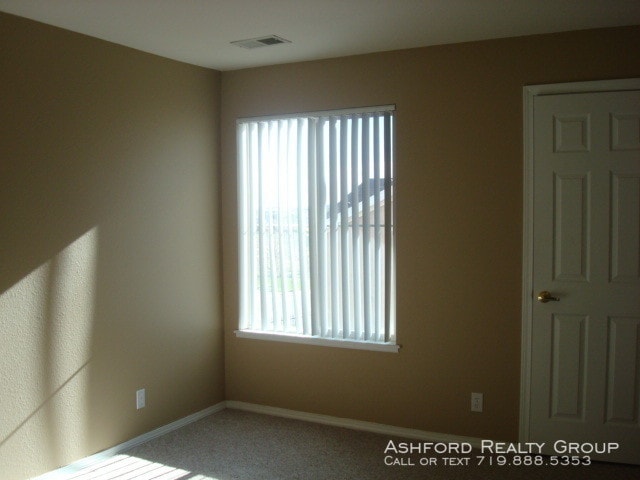 Building Photo - 3810 Strawberry Field GR. #E